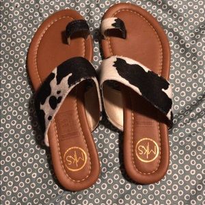 Size 8 cow print sandals brand new.